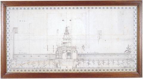 建物のイラストが描かれ、額の中に入った尾山神社神門の設計図の写真