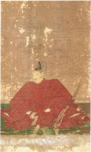 冠を被り朱色の上衣をつけた束帯姿で座っている紙本著色生駒内膳直勝画像の絵画写真