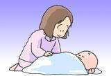 赤ちゃんを寝かしつけている女性のイラスト